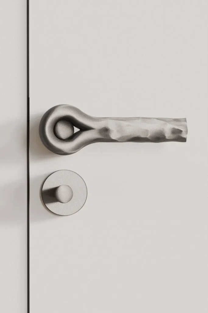 Decorative door hardware with timeless hammered design